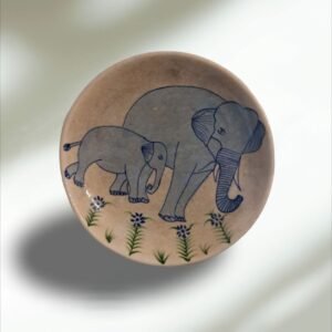 Handmade pottery wall plates with floral designs